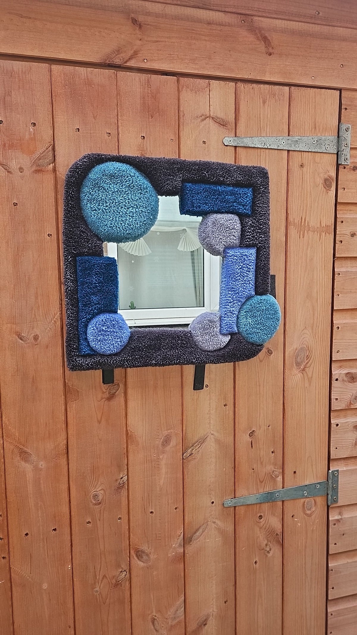 Tufted mirrors