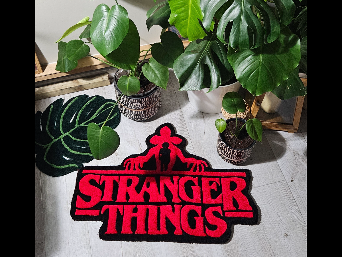STRANGER THINGS RUG RAFFLE
